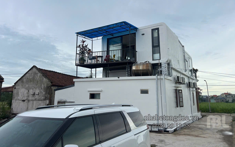 Hình ảnh hoàn thiện nhà bê tông đúc sẵn ABL V01 với cửa nhôm Xingfa và kính cường lực